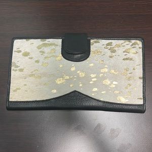 Lauren Lane
Genuine Leather and Hide Travel Wallet